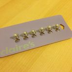 Perles pour cheveux (Claire's) : acheté 10 frs. Non utilisé: 8 frs