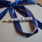 Barrette perle et strass : CHF 5.-